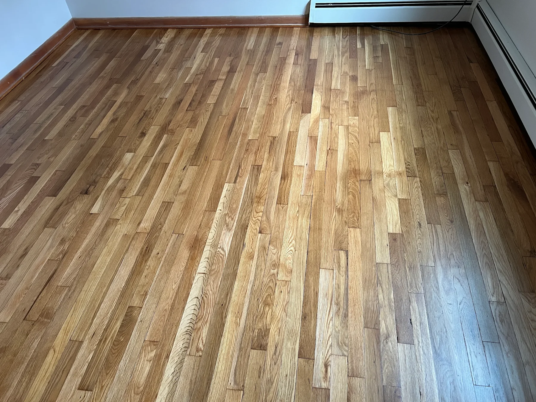 Close view of refinished hardwood flooring